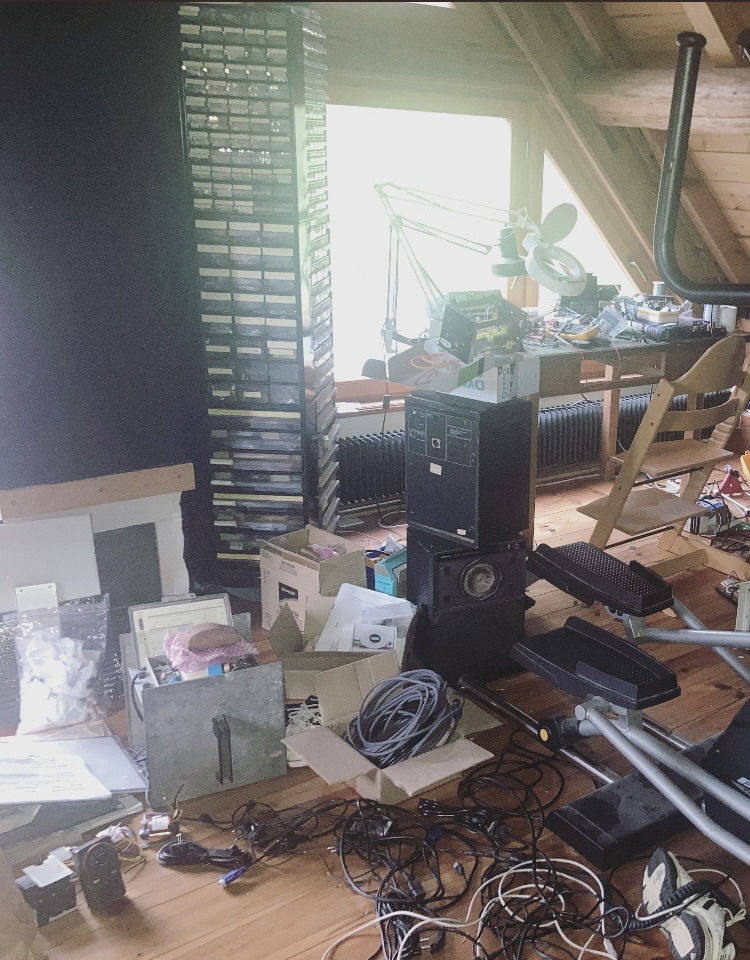 Electronics workshop with scattered components