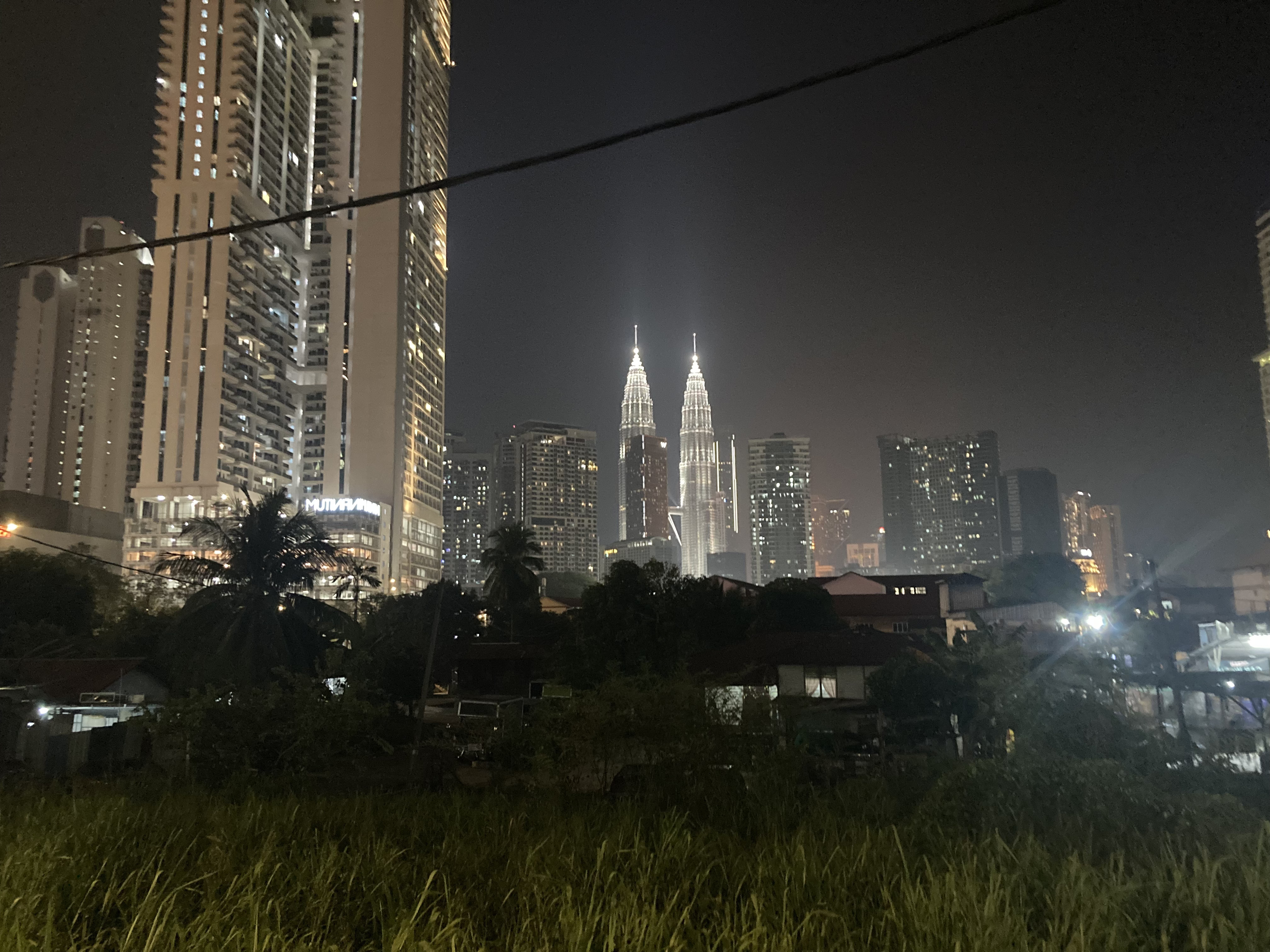 Kuala Lumpur skyscrapers through haze